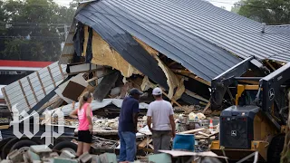 Tennessee residents recount harrowing stories of survival after flooding leaves town in ruins