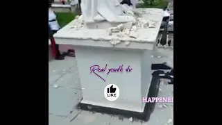 A Man In Bahamas tearing down Christopher Columbus Monument Oct 13, 2021