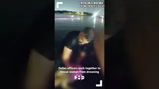 BODYCAM: Dallas officers rescue woman from drowning in lake