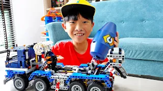 Yejun's mixer truck toy assembly play with Lego Technic car toy.