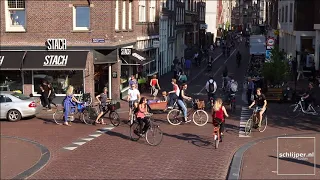 Unbelievably busy bicycle crossing in Amsterdam