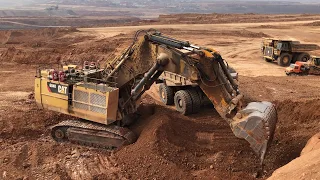 Caterpillar 6040 Excavator Loading Hitachi EH3500 Dumpers