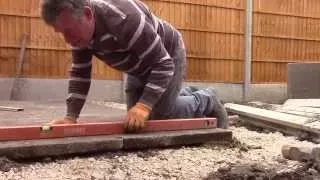 How to lay 3 x 2 slabs for a shed/patio base