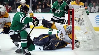 Pekka Rinne pushes across to rob Jamie Benn