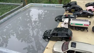 Gray Model Car Falling Into Water Welly Cars