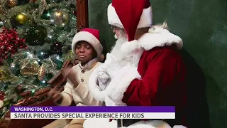 Deaf Santa using sign language to spread holiday cheer