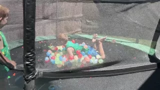 100 water balloons on trampoline with kids SloMo Funny