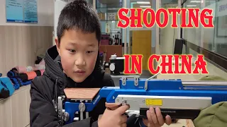 shooting in china,China Shooting Range,Chinese shooting,Chinese playing guns,Child shooting in china