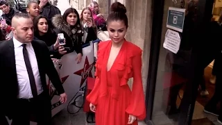 Queen Selena Gomez wearing a beautiful red dress in Paris