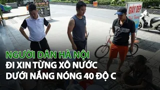 Người dân Hà Nội đi xin từng xô nước dưới nắng nóng 40 độ C| VTC14