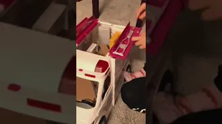 Child excited about dream toy/Barbie Ambulance