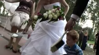 Unexpected wedding accident -  WEDDING GUEST SLIPS ON ROSE