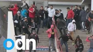 Football fans in Chile attack riot police