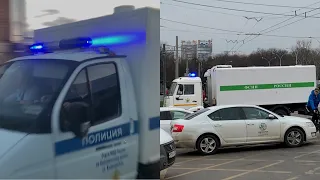 Convoy prison trucks with siren on a traffic jam