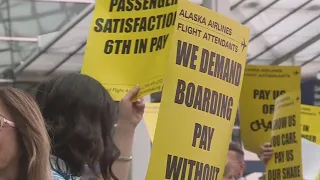 Alaska Airlines flight attendants picket for higher wages at PDX airport
