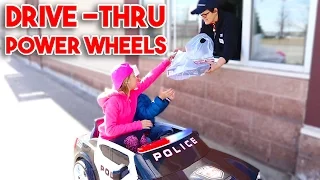 KIDS Driving Power Wheels Ride On Car to a DRIVE THRU