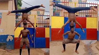 Friends Perform Amazing Head-To-Head Balancing Stunt