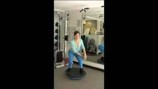 Woodchop With Dumbbell On Bosu
