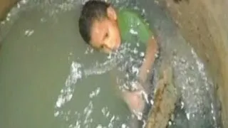 نجاة طفل كولومبي من الغرق في قنوات الصرف الصحي