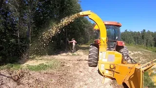 Chipping Brush piles with Kioti Tractor and Valby Chipper