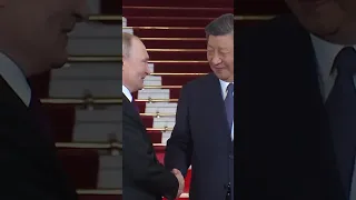 Russia's Putin Meets China's Xi in Bejing Ahead of Summit