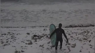 Raw: Russian Surfers Brave Icy Cold Waters