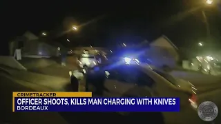 Officer shoots, kills man charging with knives