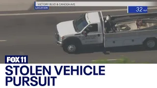 LAPD in pursuit of suspected stolen vehicle in the San Fernando Valley