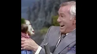Old man laughing at Monkey with Joker face