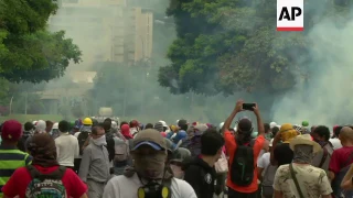 Protesters clash with police in Venezuela
