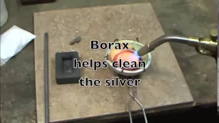 Smelting silver into a bar