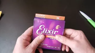 Распаковка товаров с aliexpress.Струны для гитары Elixir