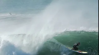 Rescue board shoots the pier by Huntington Beach Lifeguard