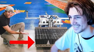xQc Reacts to World Record Domino Robot (100k dominoes in 24hrs) (Mark Rober)