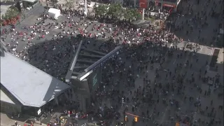 Crowd runs away from Eaton Centre after reports of shooting