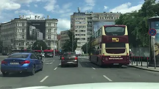 Budapest from a car: /Budaörsi út - Városligeti fasor/ POV drive through the heart of the city