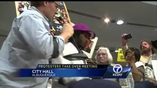 Protestors Take Over City Council Meeting