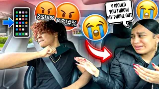 THROWING MY GIRLFRIEND PHONE OUT THE CAR WINDOW!*PRANK*