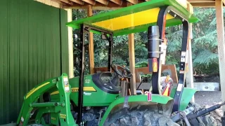 John Deere Tractor DIY steel roof with polycarbonate skylight