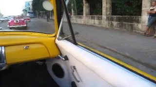 Touring Havana in 4 convertibles from the 50's