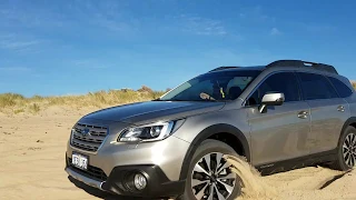 2015 Subaru Outback diesel on sand.