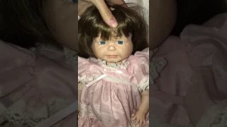 Three faced doll