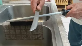 @kdhaws Sharpening a large kitchen knife from a thrift shop