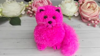 A  Cats Making of pom-poms. A  Cats made of Wool Yarn. DIY ideas from pom-poms.