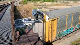 TRAIN CRASHES INTO BRIDGE. LOW CLEARANCE BRIDGE VS AUTORACKS. BRAND NEW CARS DESTROYED.