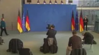 Merkel holds briefing before entering quarantine