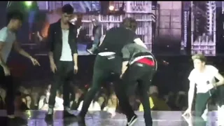 Liam tackles Harry during Teenage Kicks