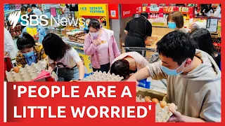 COVID-19 lockdown threat sparks panic buying in Beijing | SBS News