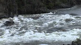 Bohnenkamp's Whitewater Customs BWC Grey Twin Boat running rapids