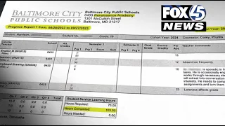 Baltimore mother accuses school of falsifying son's report card